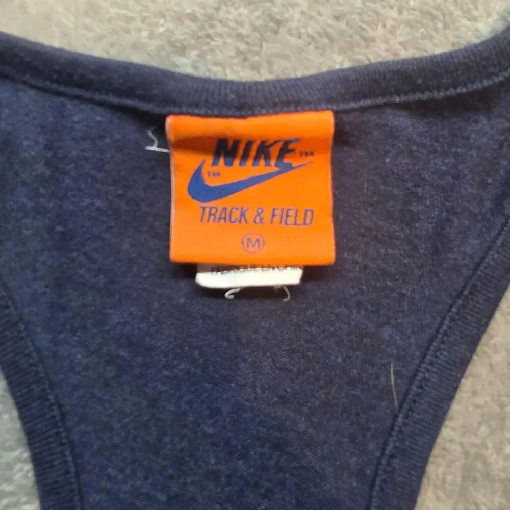 Nike Track & Field Tank Top Womens M Blue Racerback Rainbow Graphic Logo